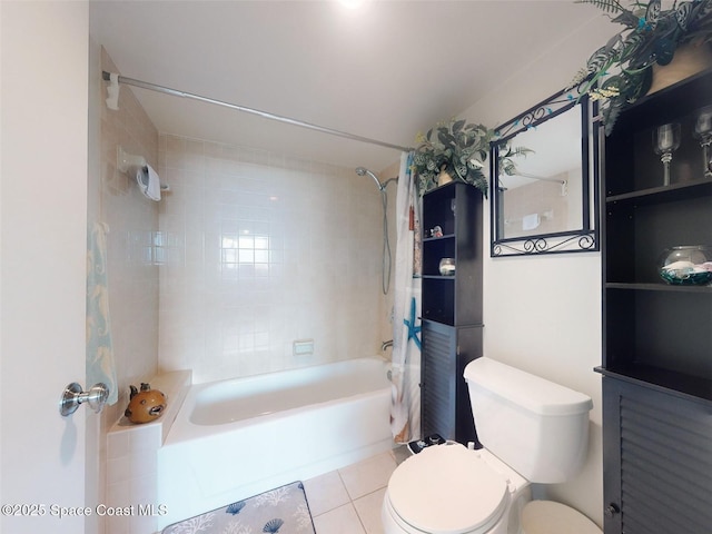 bathroom with tile patterned floors, toilet, and shower / bath combo with shower curtain