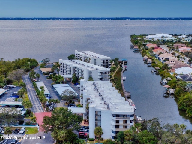 drone / aerial view featuring a water view