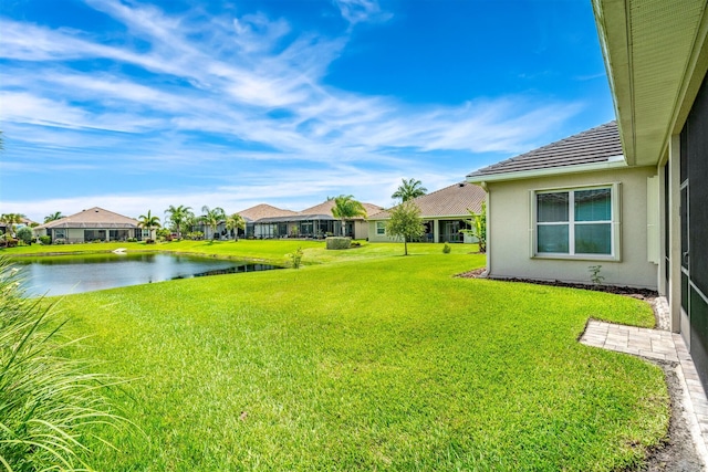 view of yard with a water view