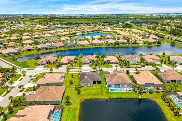 drone / aerial view featuring a water view