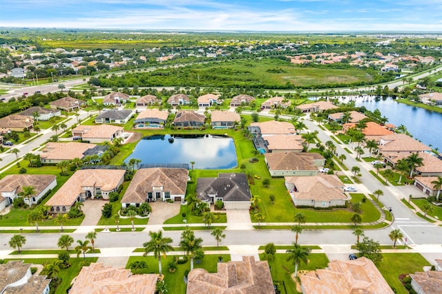 drone / aerial view with a water view