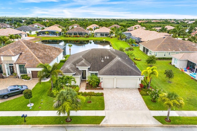 drone / aerial view featuring a water view