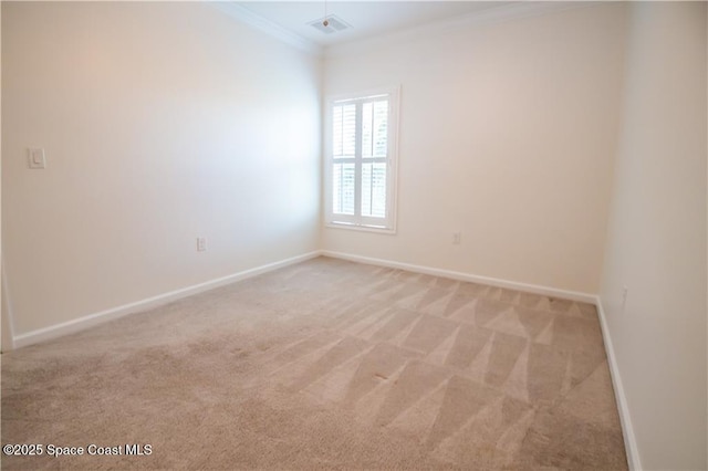 carpeted spare room with ornamental molding