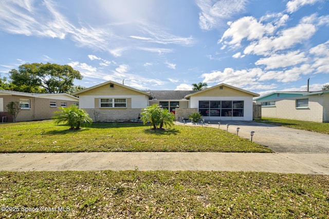 ranch-style house with a front yard