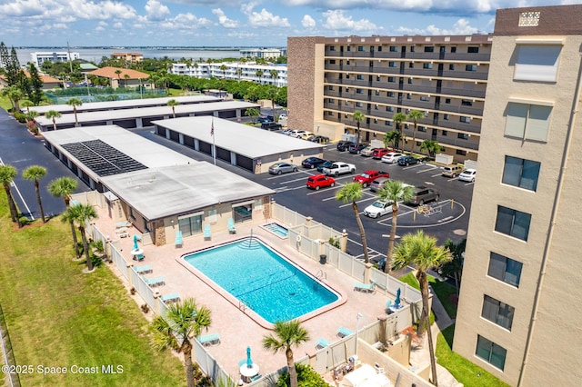 birds eye view of property featuring a water view