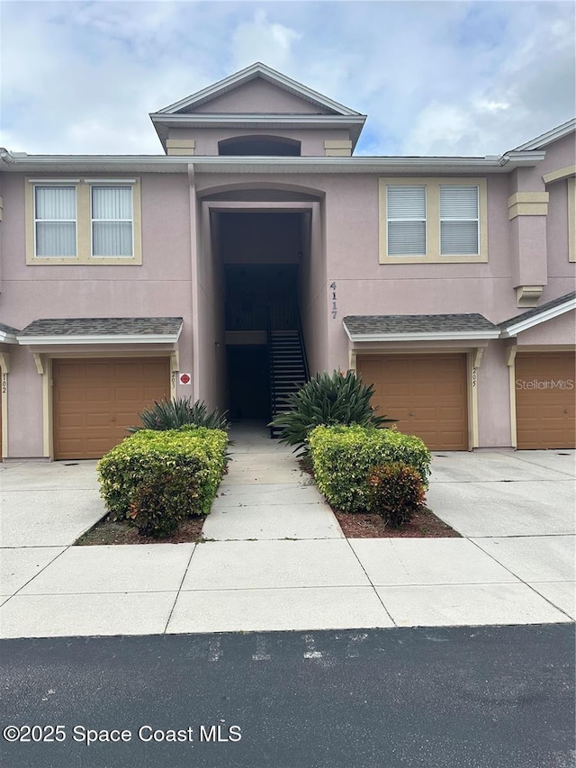 view of property with a garage