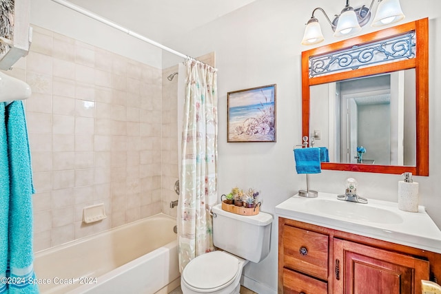 full bathroom featuring shower / bath combination with curtain, vanity, and toilet