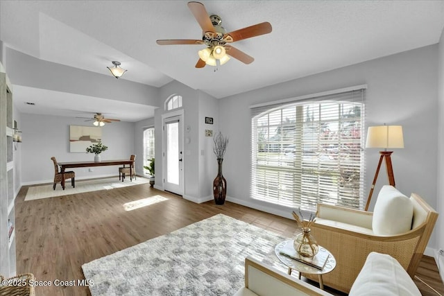 entrance foyer featuring hardwood / wood-style flooring and ceiling fan