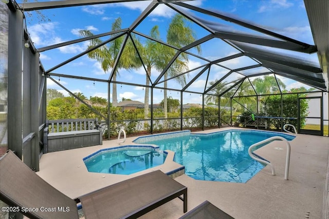 view of pool featuring a lanai and a patio area