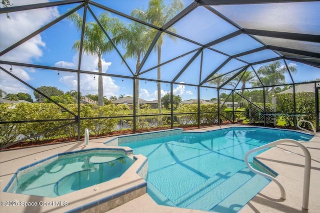 view of pool featuring a lanai and a patio