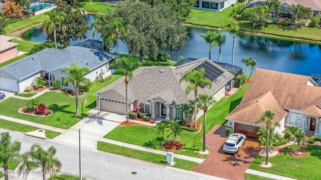 birds eye view of property featuring a water view