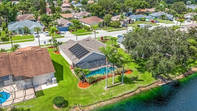 drone / aerial view featuring a water view