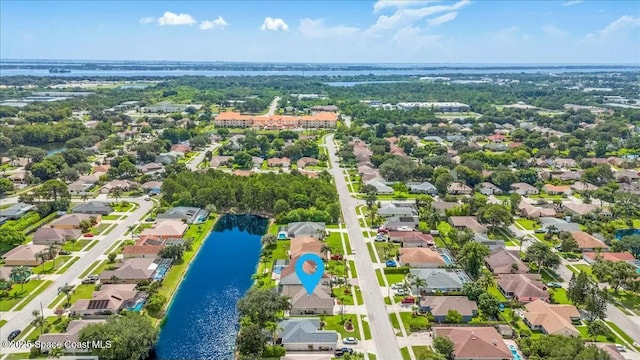 drone / aerial view featuring a water view