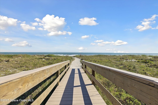 surrounding community featuring a water view