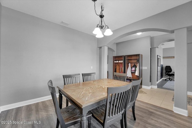 dining area featuring hardwood / wood-style floors