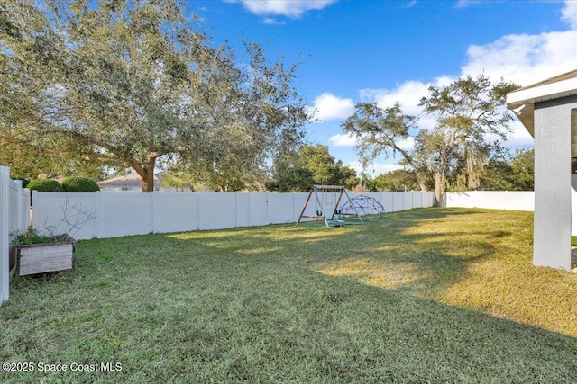 view of yard with a playground