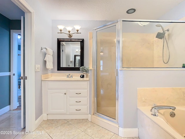 bathroom featuring tile patterned floors, plus walk in shower, and vanity