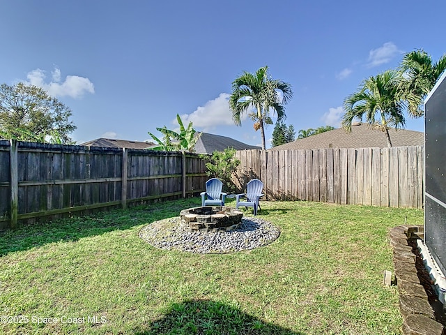 view of yard featuring a fire pit