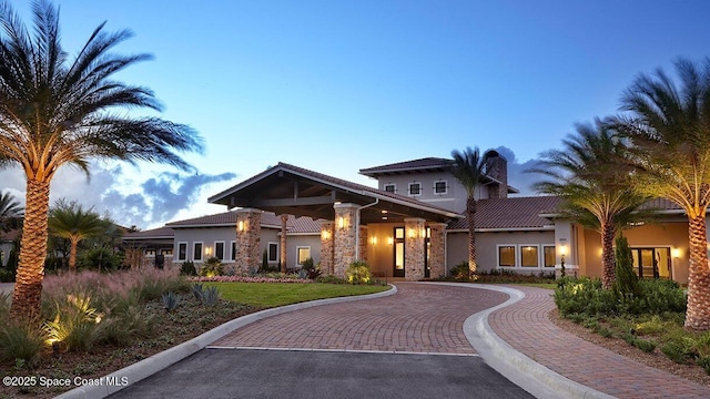 view of front of house with a yard