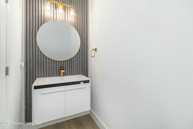 bathroom featuring vanity and hardwood / wood-style floors