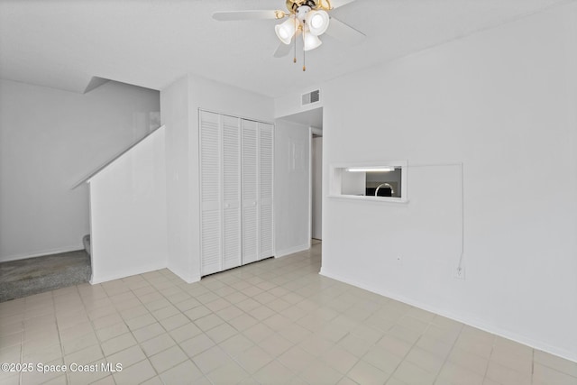 empty room featuring ceiling fan