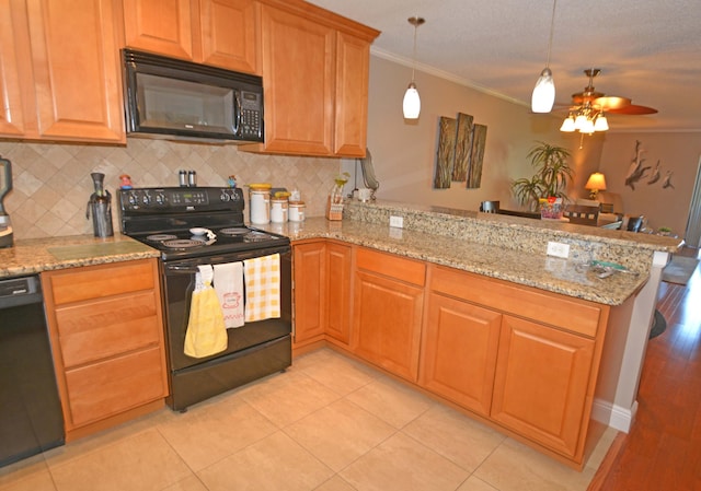 kitchen featuring light tile patterned floors, ornamental molding, black appliances, decorative light fixtures, and kitchen peninsula