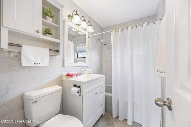 full bathroom with vanity, toilet, and shower / tub combo