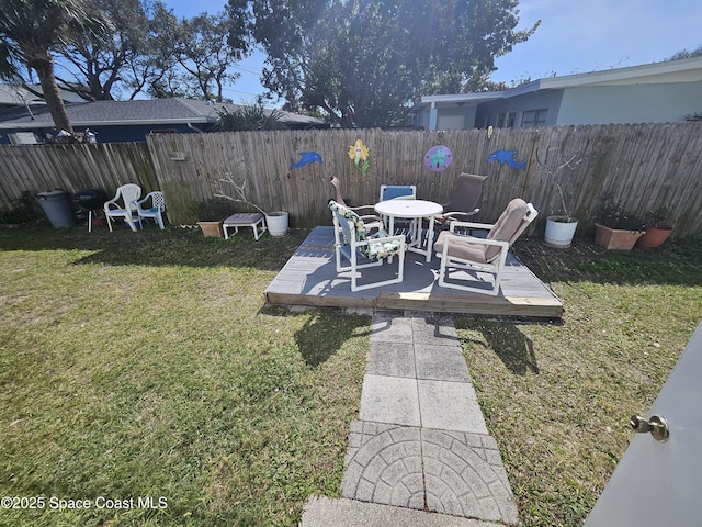 view of yard featuring a wooden deck