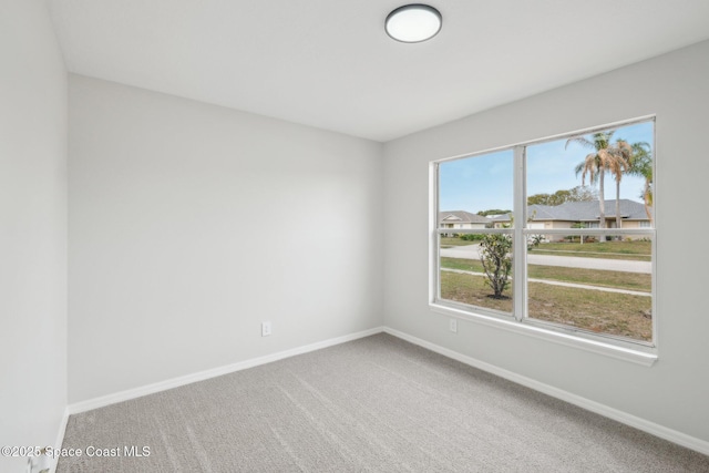 view of carpeted spare room