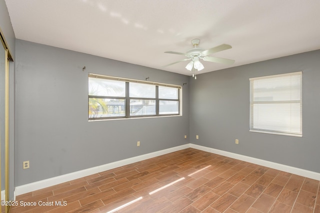 empty room featuring ceiling fan