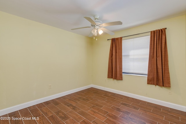 unfurnished room with ceiling fan