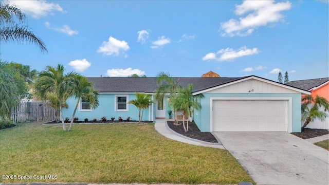 single story home featuring a garage and a front yard