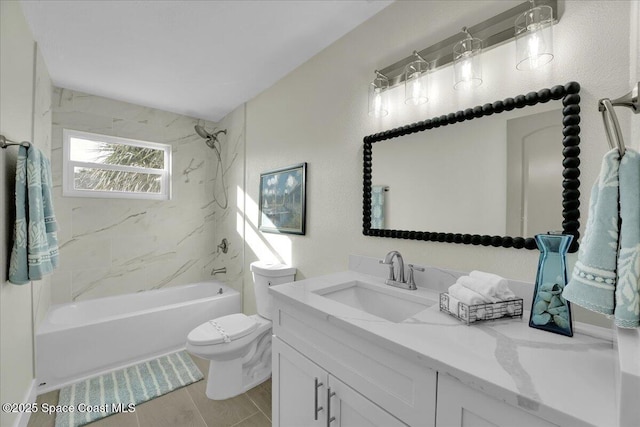 full bathroom with tiled shower / bath, vanity, and toilet