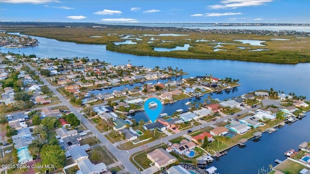 drone / aerial view featuring a water view