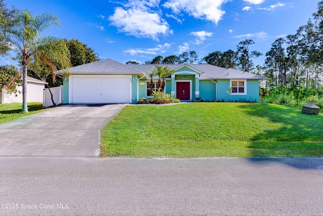 ranch-style house with a garage and a front yard