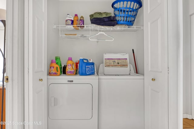 washroom with washer and clothes dryer