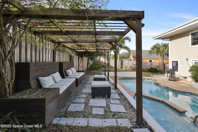 view of patio / terrace featuring a fenced in pool, outdoor lounge area, and a pergola