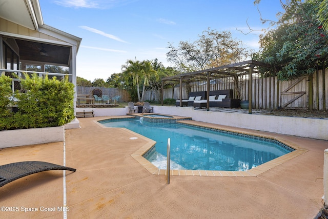 view of pool with an in ground hot tub, an outdoor hangout area, a pergola, and a patio area