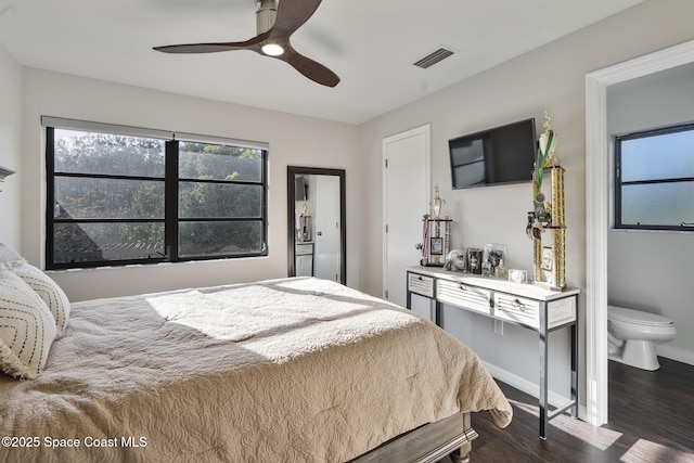 bedroom with dark wood-type flooring and ceiling fan