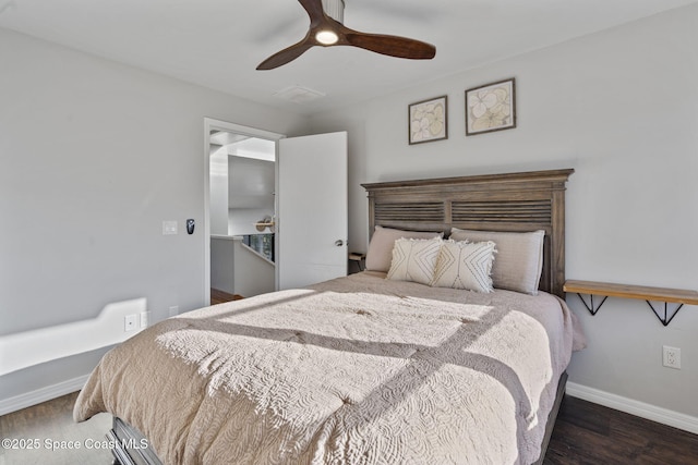 bedroom featuring ceiling fan and dark hardwood / wood-style flooring