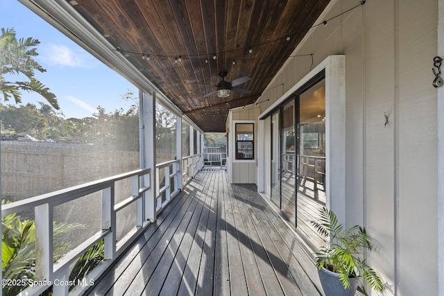 wooden terrace with ceiling fan