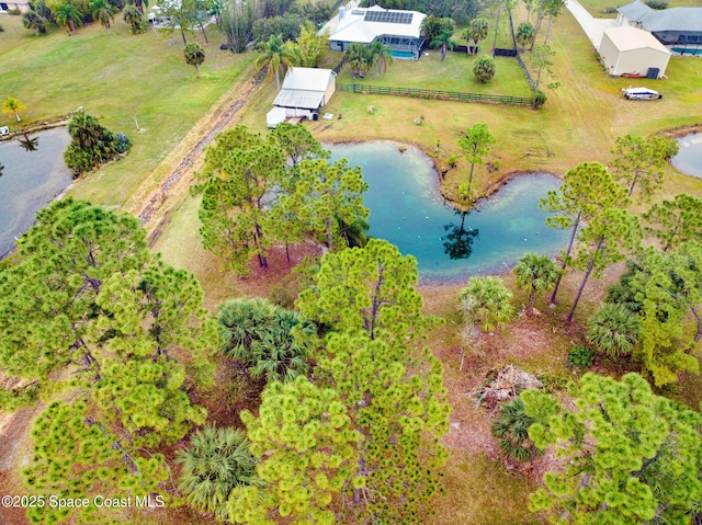 bird's eye view with a water view and a rural view