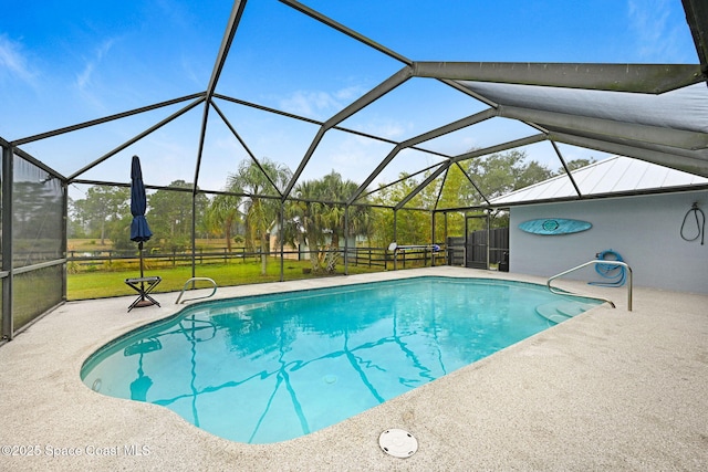 view of pool featuring a patio and a lanai