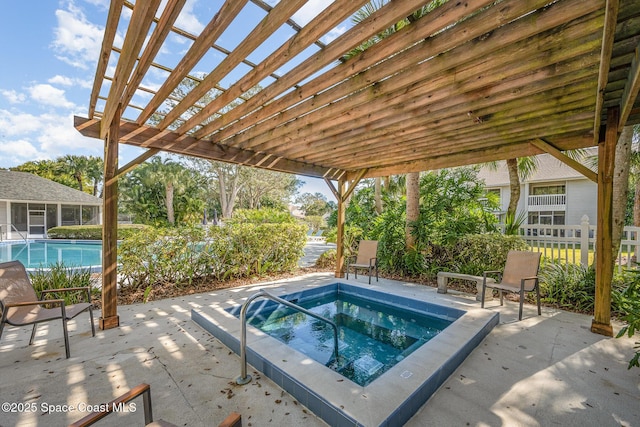 view of swimming pool with a pergola, a patio, and an in ground hot tub