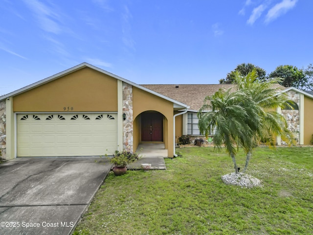 ranch-style home with a garage and a front yard