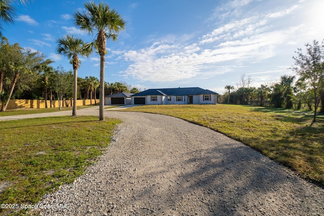 single story home with a front yard