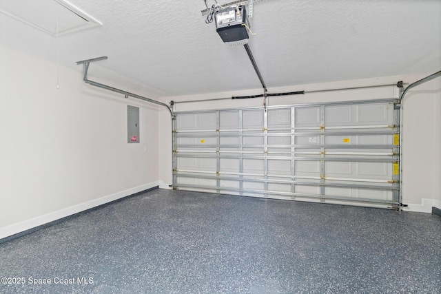 garage featuring a garage door opener and electric panel