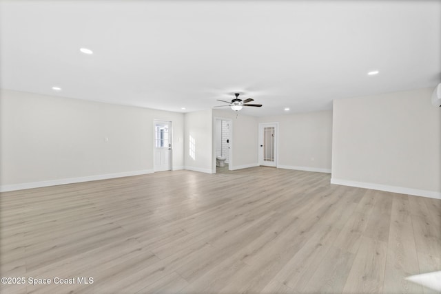 unfurnished living room with light hardwood / wood-style flooring and ceiling fan