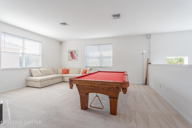 recreation room with light colored carpet and pool table