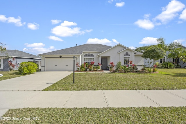 ranch-style home with a garage and a front lawn